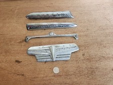 Hudson 210623 Emblem 213598 Commodore 213594 Radio Delete Plate 213590 Dash Trim picture