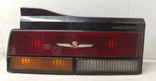 1984 - 1985 CADILLAC CIMARRON REAR LEFT SIDE TAIL LIGHT ASSEMBLY OEM, 166-01144 picture