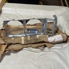 New OEM D3MY13405 Ford 1973-75  MERCURY METEOR MONTCALM LH HEADLIGHT BEZEL DOOR picture