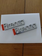 1982 To 1988 Oldsmobile FIRENZA Side Emblems NOS OEM   Set Of 2 picture