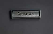 1970s Pontiac Ventura Door Panel Emblem 1666044 2.75