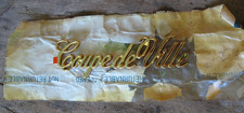 NOS Cadillac 1989-92? Coupe de Ville Gold Plastic Rear 1/4 Panel Emblem 20747492 picture