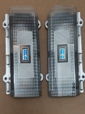 1984 to 1988 Oldsmobile Cutlass Custom Clear Tail Light Set with Blue Emblems picture