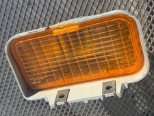 NOS 1976-1987 Chevrolet Chevy Chevette LH Turn Signal Housing Assembly picture