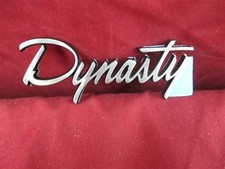NOS OEM Dodge Dynasty Rear Sail Panel Nameplate Emblem 1988 - 91 picture