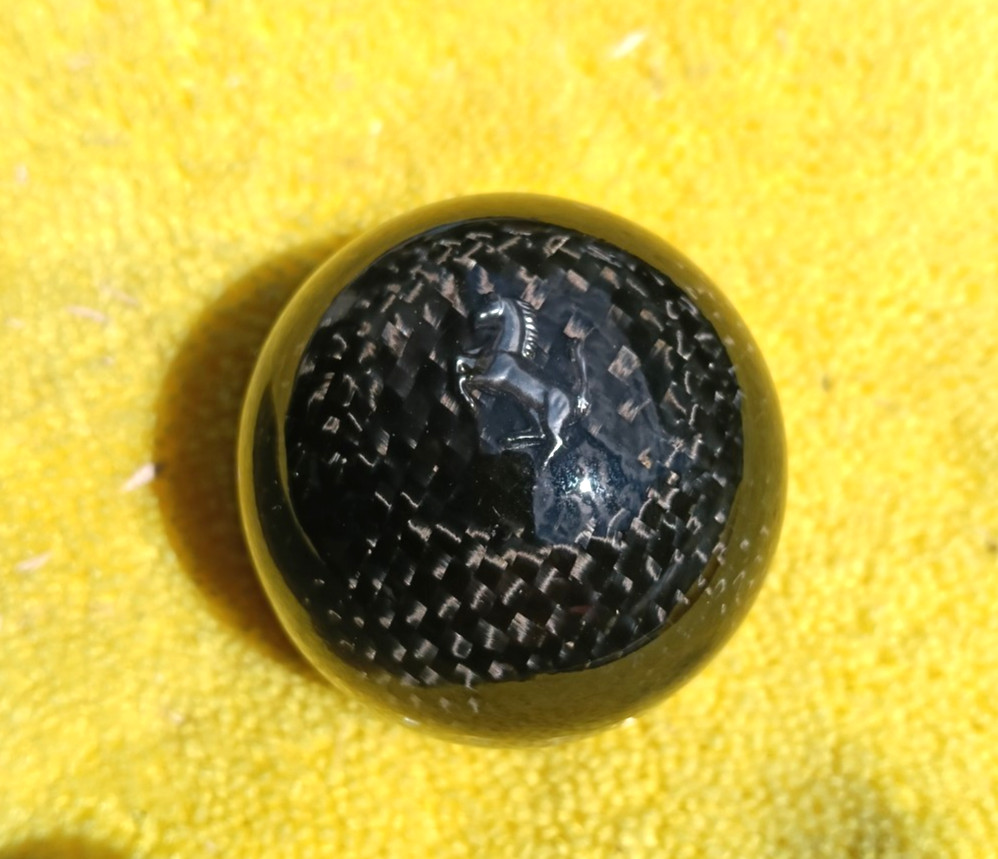 Ferrari F50 type shift knob with embedded stone chain bezel