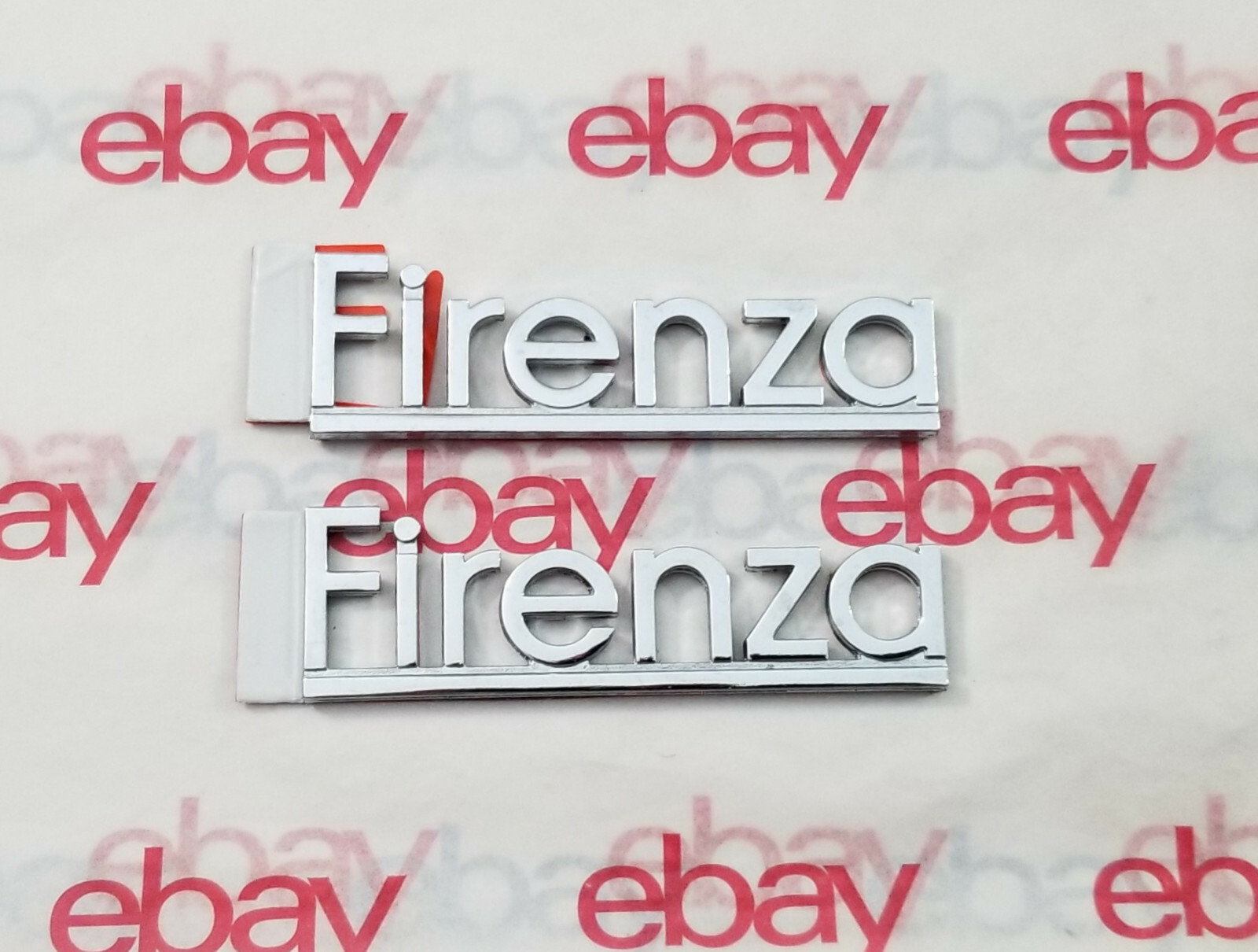 1980's Oldsmobile Firenza Fender Emblems OEM NOS (2 pieces) METAL