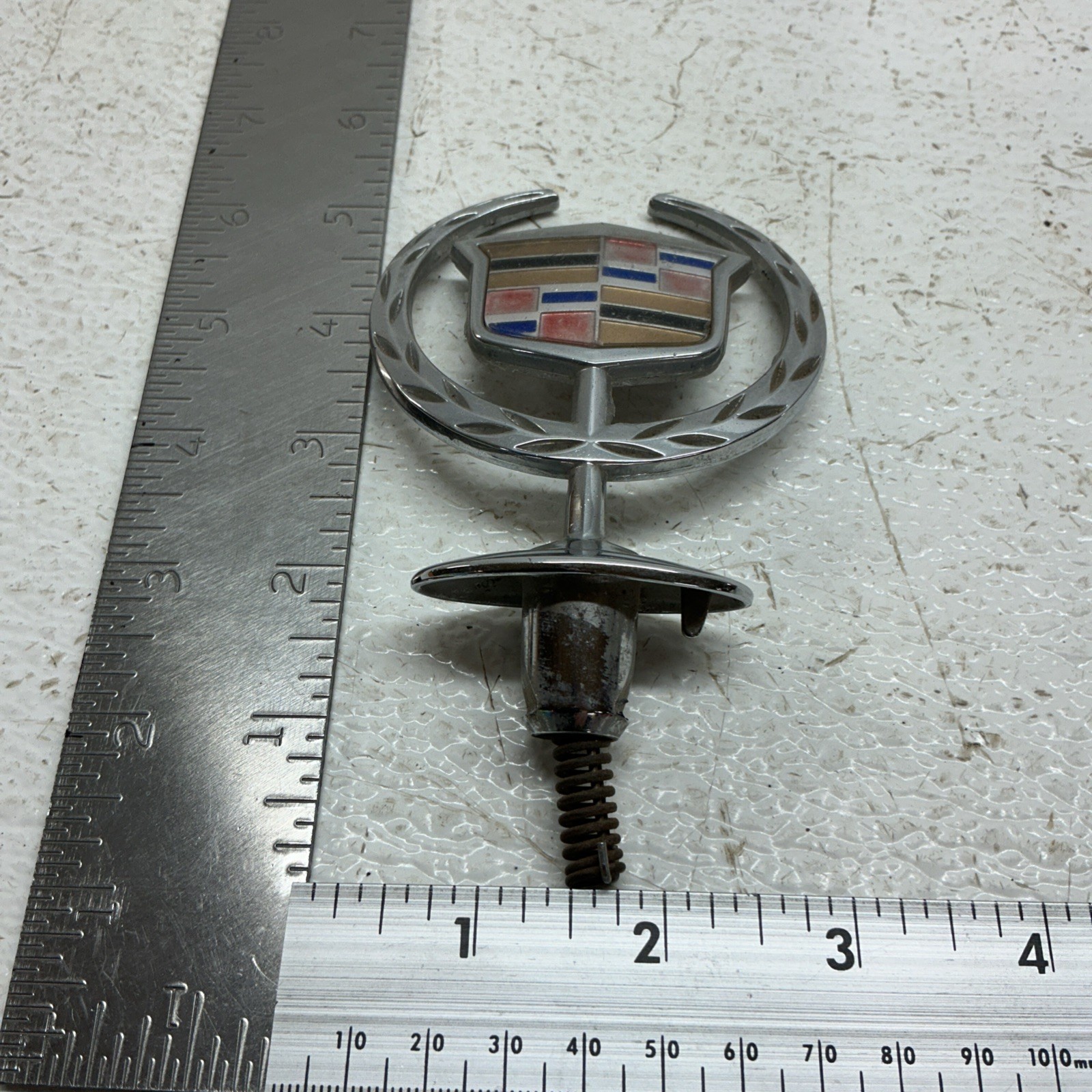 00-05 Cadillac  Brougham Hood Ornament Header Emblem