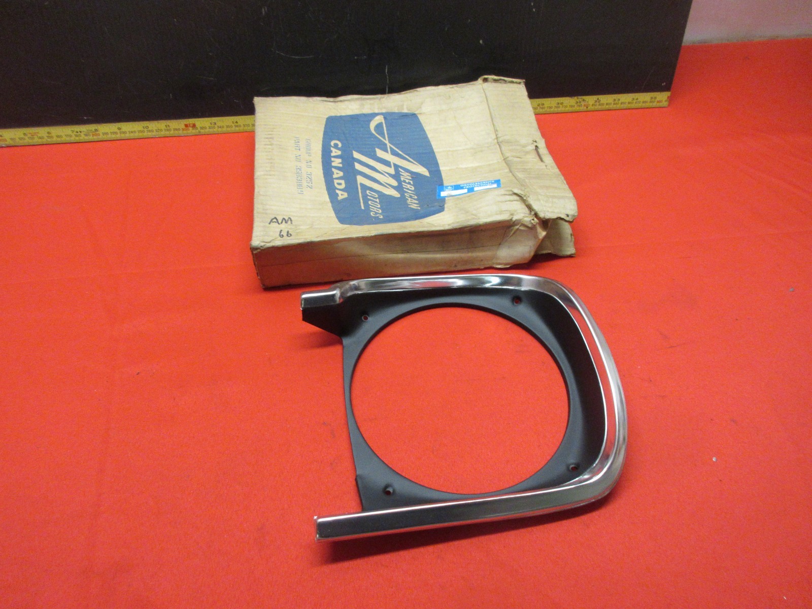 1967-1969 AMC RAMBLER AMERICAN SCRAMBLER HEADLIGHT BEZEL LEFT SIDE NOS
