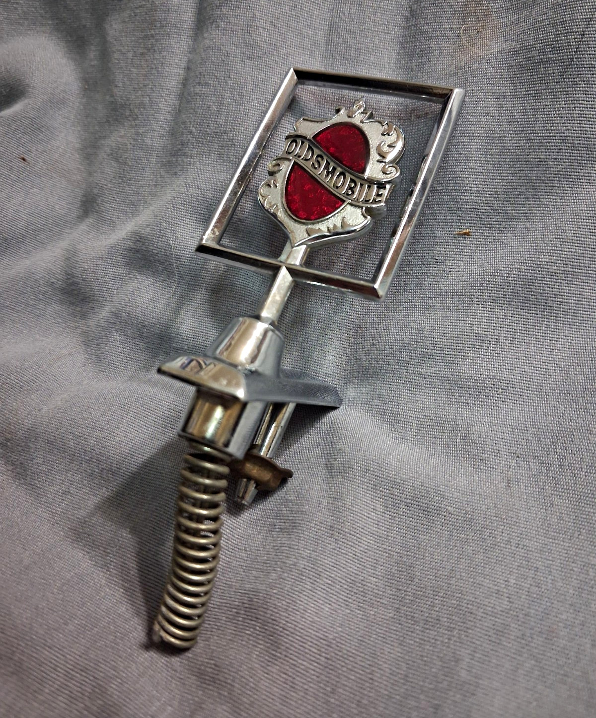 Vintage Oldsmobile Hood Ornament Chrome Emblem Shield Crest Frame Red Insert OEM