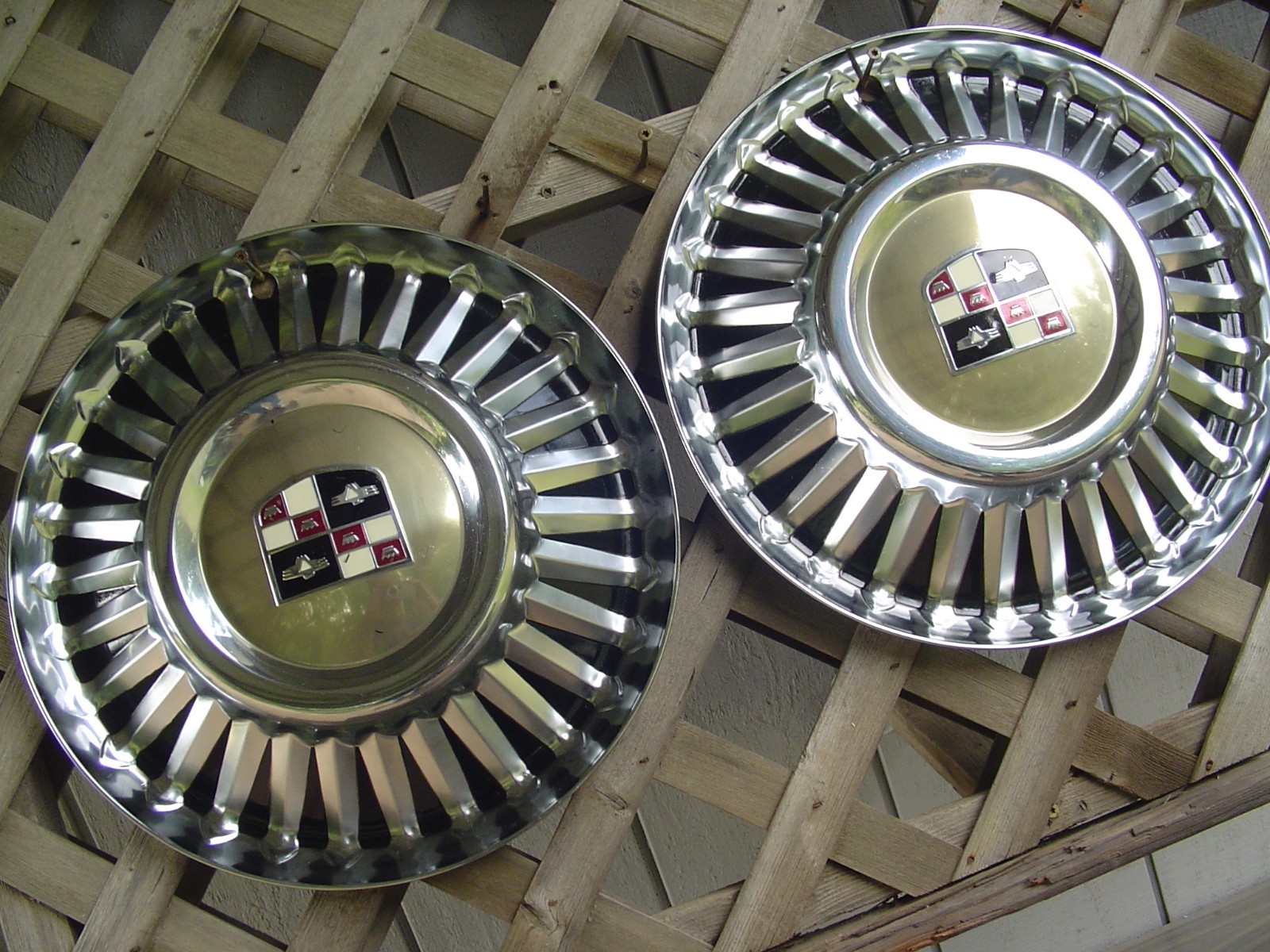 TWO VINTAGE 1957 1958 STUDEBAKER SILVER GOLDEN HAWK COMMANDER STARLINER HUB CAPS