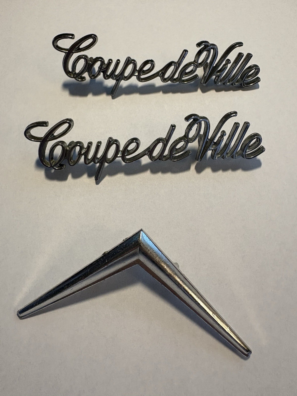 Cadillac COUPE DE VILLE Emblems with Cadillac “V” Emblem